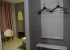Прихожая в номере Премиум «Нежный серый» в Шокотель