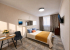 Кровать в номере 1 в Loft Studio