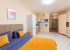 Спальная зона в апартаментах 3 в Loft Studio