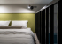Большая кровать в номере Studio Suite в Prive Luna