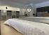 Двуспальная кровать в номере Deluxe в Prive Luna