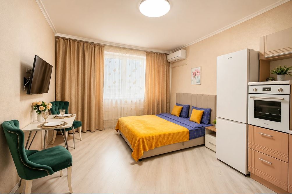 Кровать в апартаментах 3 в Loft Studio